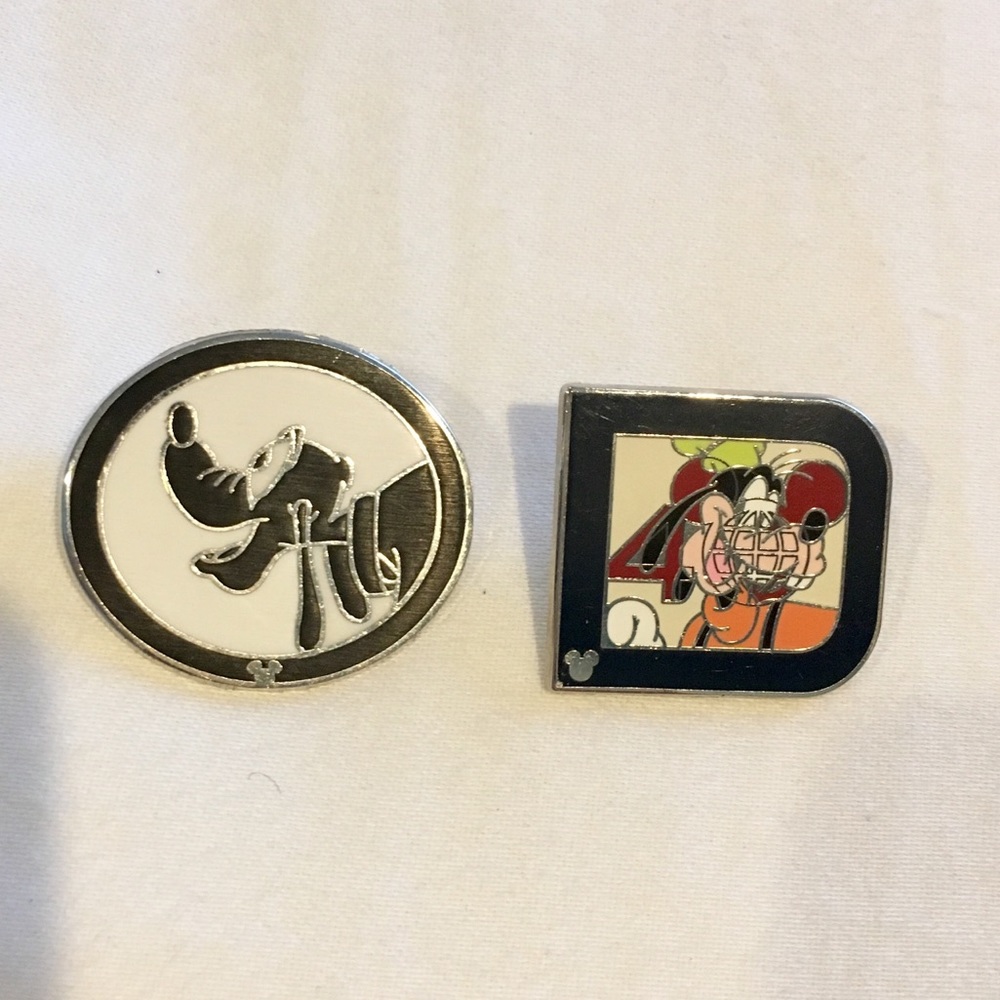 Disney pin trading Hidden Mickey Goofie and Pluto